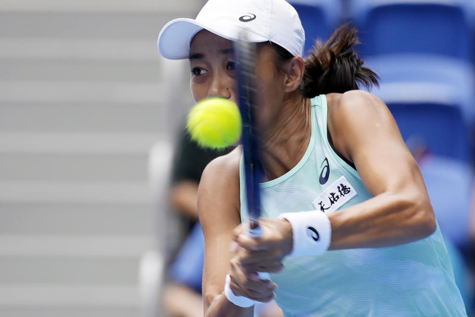 Zhang Shuai of China returns a shot against Petra Martic of Croatia during a single's quarterfinal match in the Pan Pacific Open tennis tournament at Ariake Colosseum, Friday, Sept. 23, 2022, in Tokyo. (AP Photo/Eugene Hoshiko)