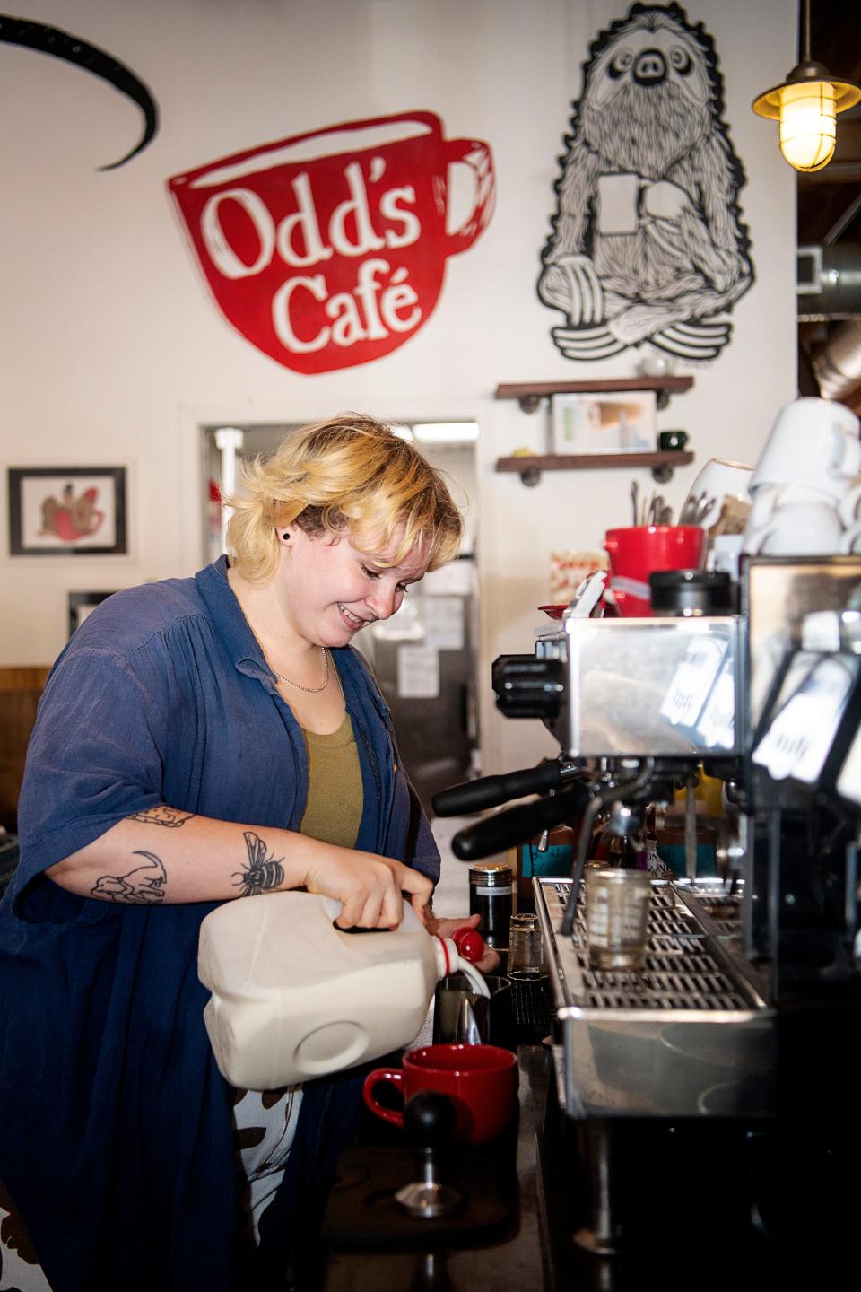 Robin Fredrickson, a manager at Odd’s Café, pours milk to steam for a Salted Maple Latte, September 7, 2023.