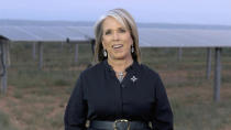 FILE - In this image from video, New Mexico Gov. Michelle Lujan Grisham speaks in front of solar panels during the third night of the Democratic National Convention on Wednesday, Aug. 19, 2020. Faulting inaction in Washington, governors and state lawmakers are racing to get needed pandemic relief to small businesses, the unemployed, renters and others affected by the widening coronavirus outbreak. (Democratic National Convention via AP, File)