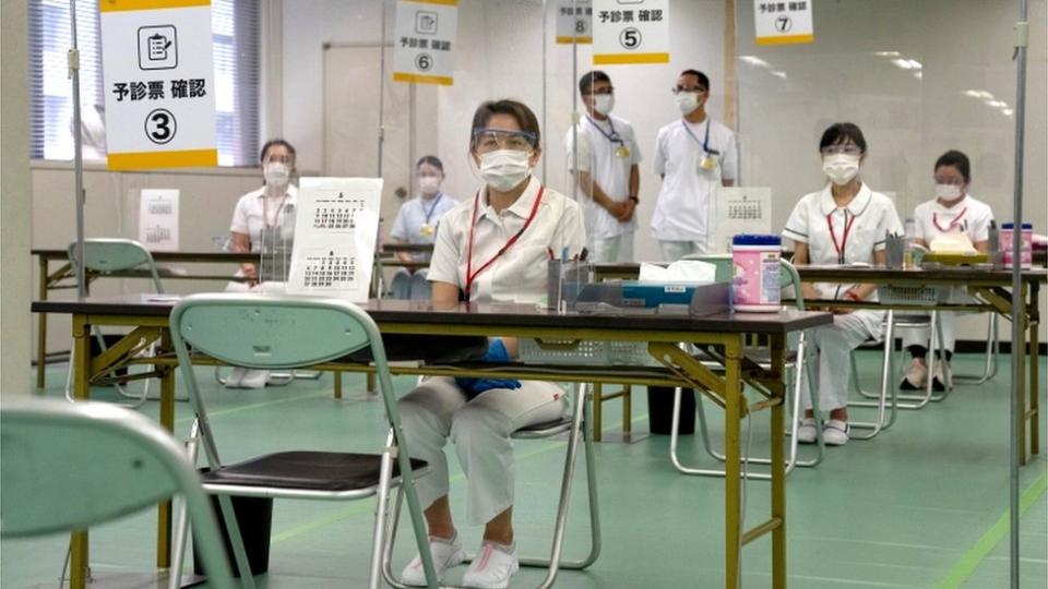 Nurses waiting for patients to arrive for their vaccinations