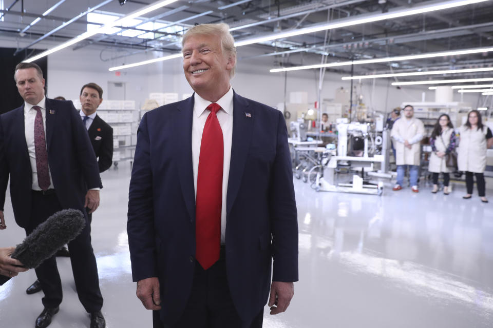 President Donald Trump tours the Louis Vuitton Workshop Rochambeau in Alvarado, Texas, Thursday, Oct. 17, 2019. (AP Photo/Andrew Harnik)