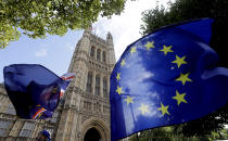 A European Union flag flies near Britain's Parliament in London, Thursday, Sept. 26, 2019. An unrepentant Prime Minister Boris Johnson brushed off cries of "Resign!" and dared his foes to try to topple him Wednesday at a raucous session of Parliament, a day after Britain's highest court ruled he acted illegally in suspending the body ahead of the Brexit deadline. (AP Photo/Kirsty Wigglesworth)