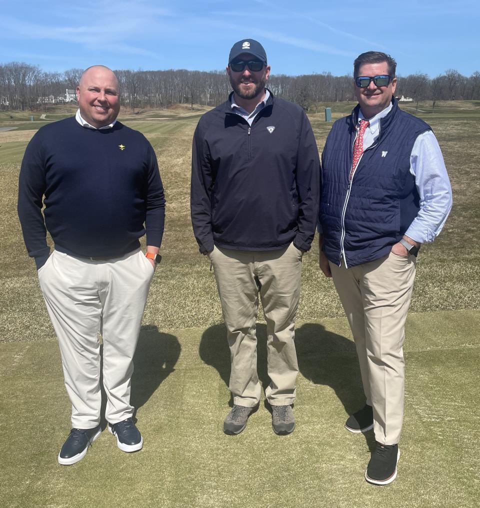 From left, head pro Andy Lane, superintendent Adam Moore and general manager Troy Sprister stand on the 15th tee box that was built for the 1925 U.S. Open and then was lost for decades before it was found during the course restoration last fall.