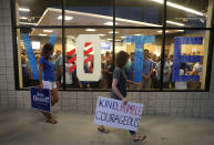 <p>People arrive to hear Democratic candidate Jon Ossoff speaks during a rally to thank volunteers and supporters on the last night before election day as he runs for Georgia’s 6th Congressional District on June 19, 2017 in Roswell, Ga. (Photo: Joe Raedle/Getty Images) </p>