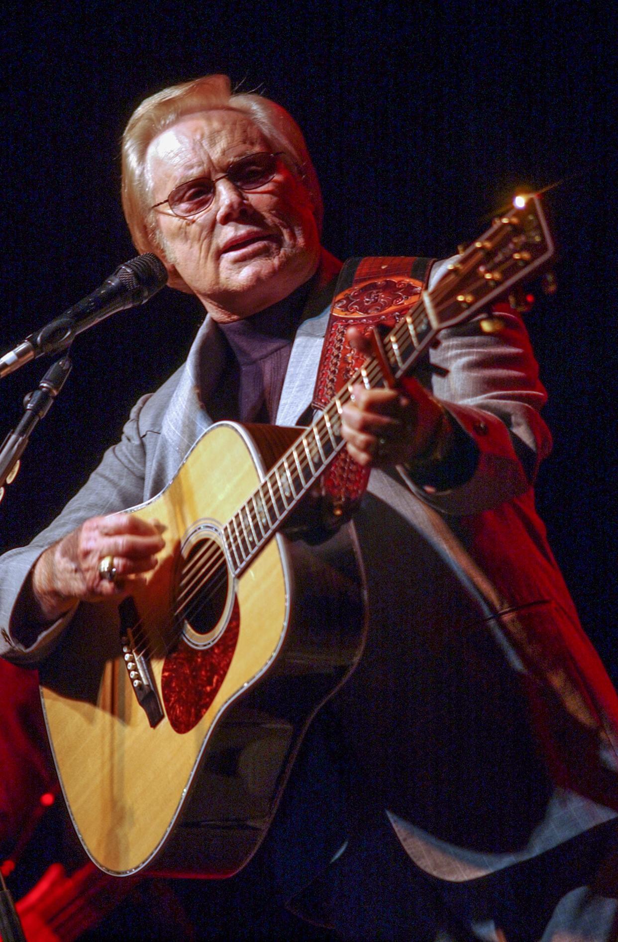 FILE - Country music legend George Jones plays in Anderson, S.C., on February 7, 2003. Jones once called “You Are My Sunshine” the most perfect song ever written.