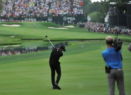 Jul 31, 2016; Springfield, NJ, USA; Jimmy Walker hits a shot on the 18th hole during the Sunday round of the 2016 PGA Championship golf tournament at Baltusrol GC - Lower Course. Mandatory Credit: Eric Sucar-USA TODAY Sports