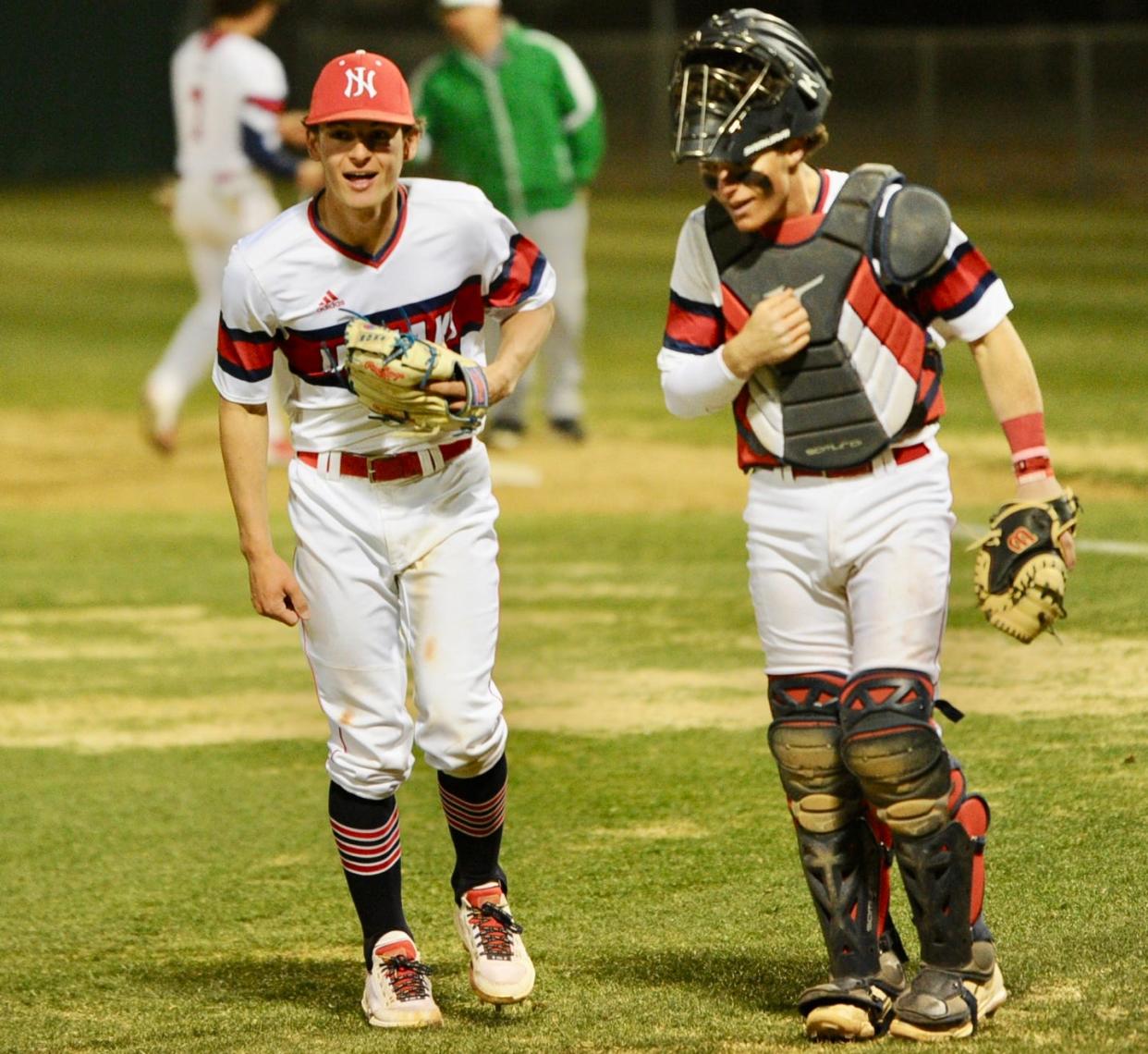 Jim Ned pitcher Blaine Palmer celebrates with catcher Braden Lewis after beating Wall 7-0 on Thursday.