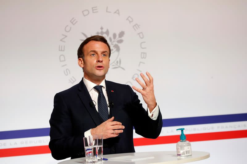 FILE PHOTO: French President Emmanuel Macron addresses virtual Davos World Economic Forum, in Paris