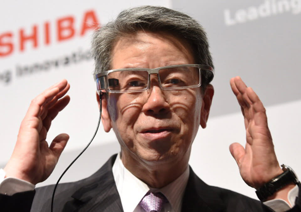 Toshiba CEO Hisao Tanaka using smart glasses