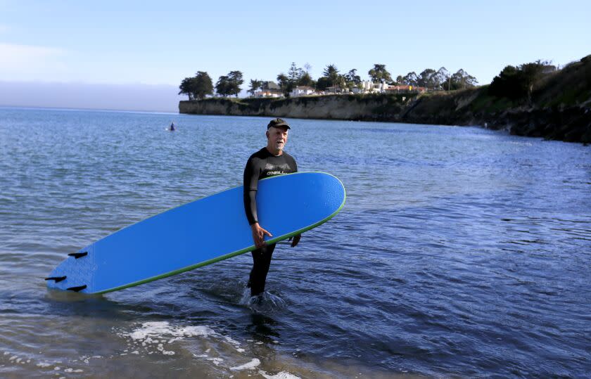 CALIFORNIA, CA -- THURSDAY, JULY 28, 2016: Los Angeles Times columnist Steve Lopez finally realizes his childhood dream to surf in Santa Cruz. Lopez is on a California coastal tour marking the 40th anniversary of the Coastal Act. Photo taken in Santa Cruz, CA, July 28, 2016. (Allen J. Schaben / Los Angeles Times)