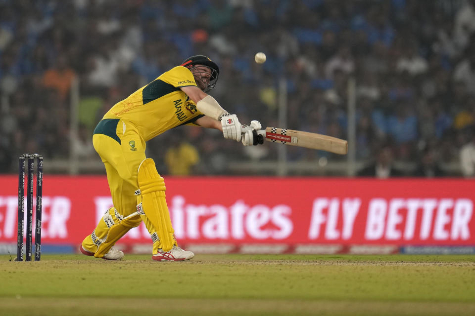 Australia's Travis Head hits a boundary during the ICC Men's Cricket World Cup final match between Australia and India in Ahmedabad, India, Sunday, Nov. 19, 2023. (AP Photo/Aijaz Rahi)