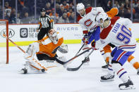 Philadelphia Flyers' Alex Lyon (34) cannot stop a goal by Montreal Canadiens' Tomas Tatar (90) during the first period of an NHL hockey game, Thursday, Jan. 16, 2020, in Philadelphia. (AP Photo/Matt Slocum)