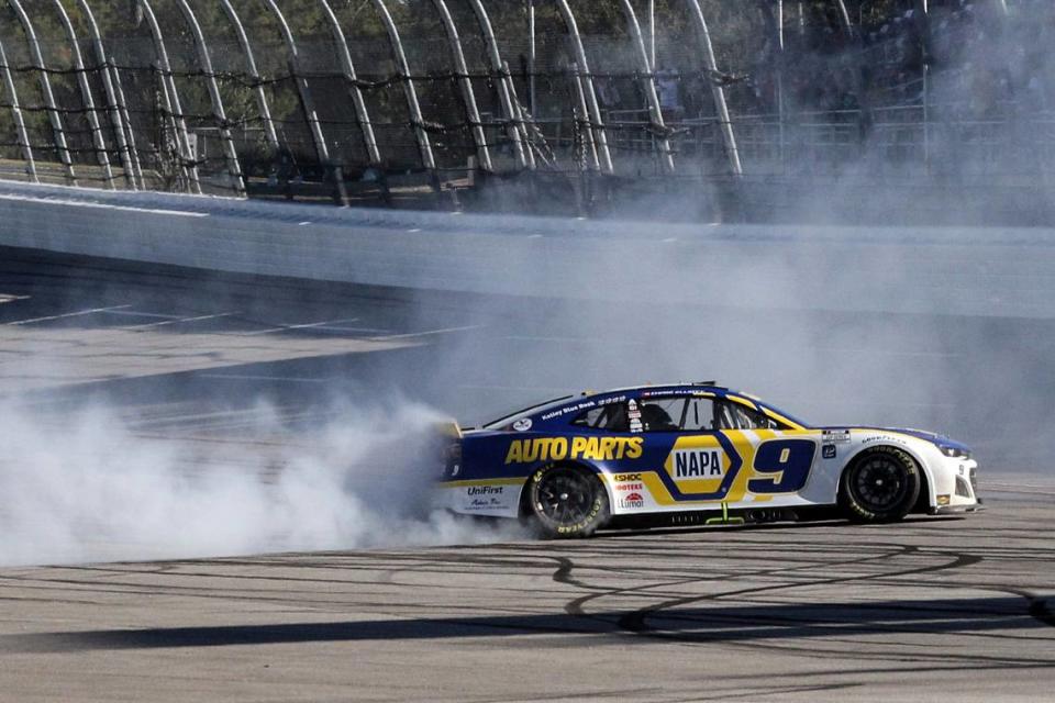 Chase Elliott does a burnout after winning a NASCAR Cup Series auto race, Sunday, Oct. 2, 2022, in Talladega, Ala. (AP Photo/Skip Williams)