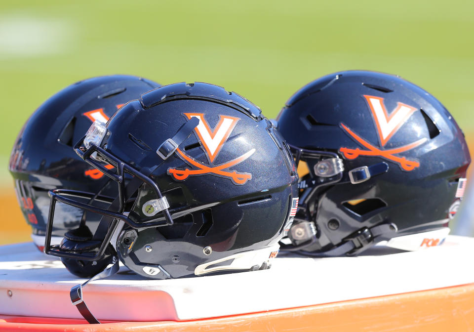 CHARLOTTESVILLE, VA - OCTOBER 29: Virginia Cavaliers helmets resting on a table during a college football game between the Miami Hurricanes and the Virginia Cavaliers on October 29, 2022, at Scott Stadium in Charlottesville, VA. (Photo by Lee Coleman/Icon Sportswire via Getty Images)