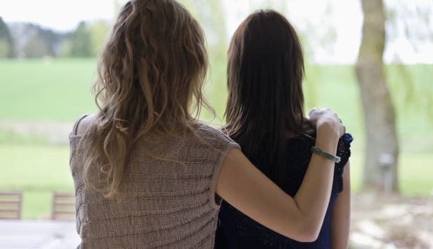 Rear view of a woman with her mother