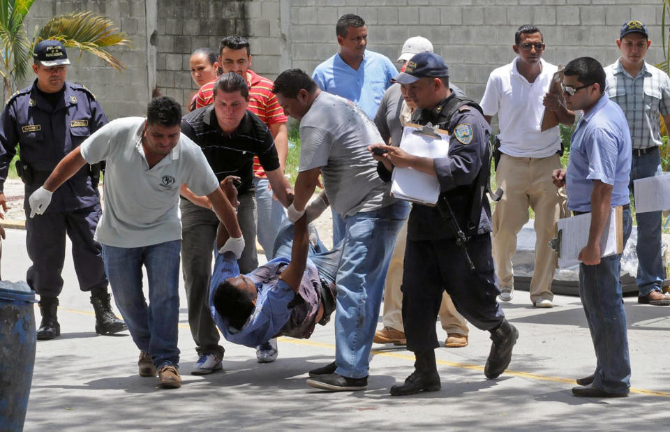 La muerte acecha en cualquier rincón de ciudades hondureñas como San Pedro Sula (AFP | STR)