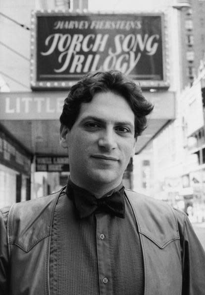 <div class="inline-image__caption"><p>American playwright and actor Harvey Fierstein stands in leather vest and bow tie in front of the marquee of the Little Theatre (now the Helen Hayes Theatre) where his semi-autobiographical play, 'Torch Song Trilogy,' is playing, 240 West 44th Street, New York, early 1980s. The play was later made into a movie.</p></div> <div class="inline-image__credit">Bernard Gotfryd/Getty Images</div>