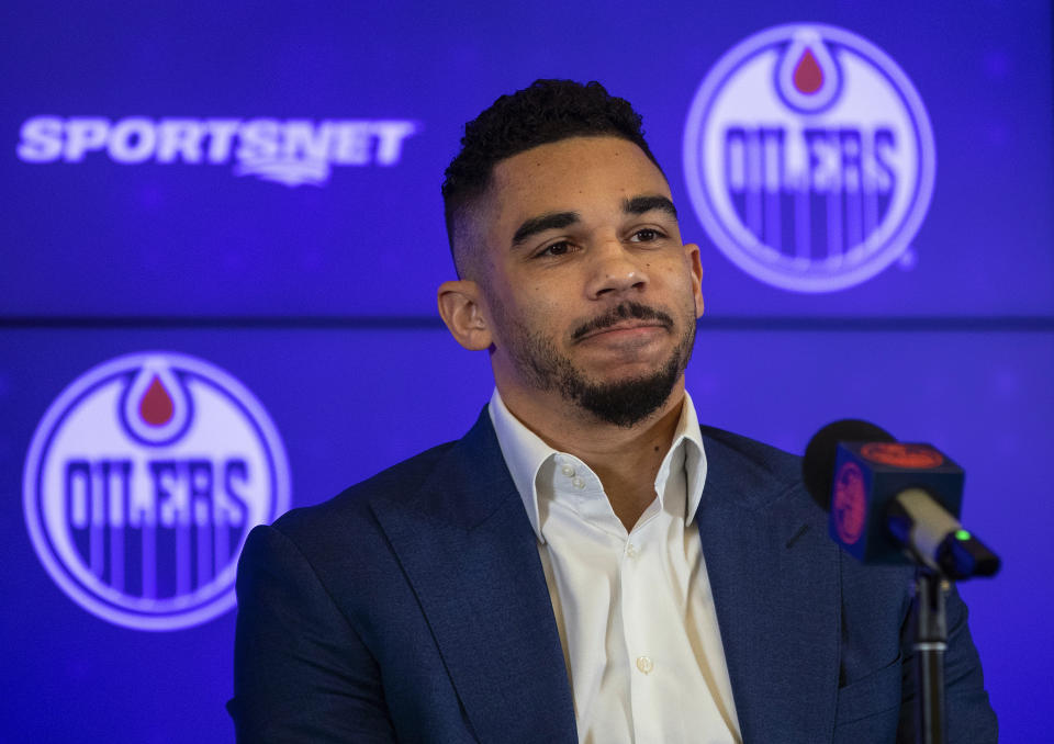 New Edmonton Oilers NHL hockey player Evander Kane speaks during a press conference in Edmonton, Alberta, Friday, Jan. 28, 2022. (Jason Franson/The Canadian Press via AP)