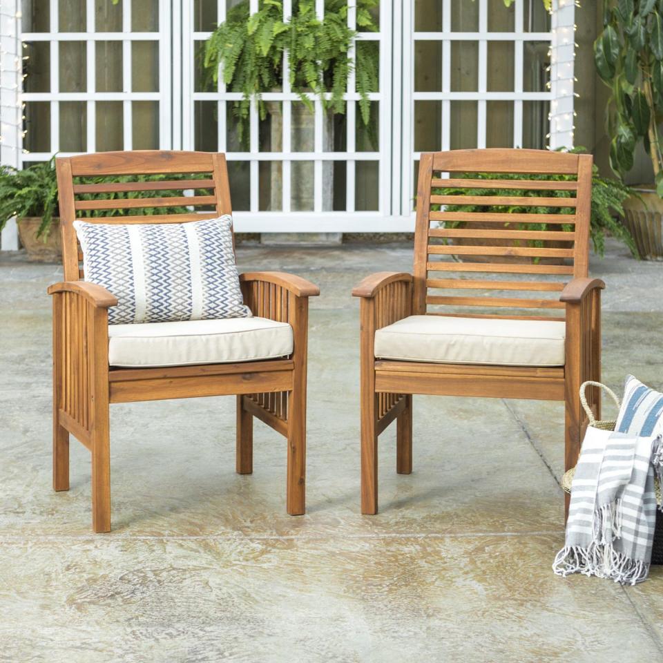 Manor Park Acacia Wood Outdoor Patio Chairs with Cushions, set of 2. Image via Walmart.