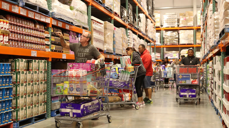shoppers in Costco aisle