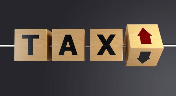 "TAX" in block letters