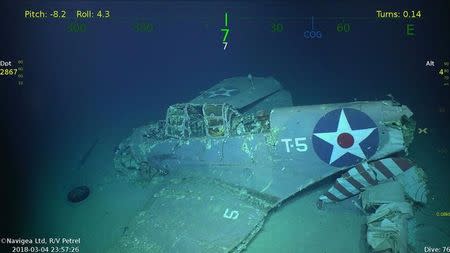 A fighter aircraft is seen in the wreckage of the sunken USS Lexington, a World War Two U.S. Navy aircraft carrier, in this handout image obtained March 6, 2018 courtesy of Paul G. Allen. Mandatory Credit PAUL G. ALLEN/HANDOUT/via REUTERS