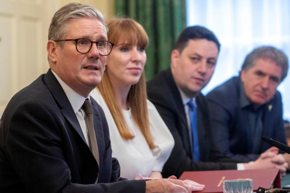 Britain's Prime Minister Keir Starmer (L) speaks next to Britain's Deputy Prime Minister and Levelling Up, Housing and Communities Secretary Angela Rayner (2ndL), Tees Valley mayor Ben Houchen and Liverpool mayor Steve Rotheram during the first roundtable meeting with regional English mayors at 10 Downing Street in London on July 9, 2024. (Photo by Ian Vogler / POOL / AFP) (Photo by IAN VOGLER/POOL/AFP via Getty Images)