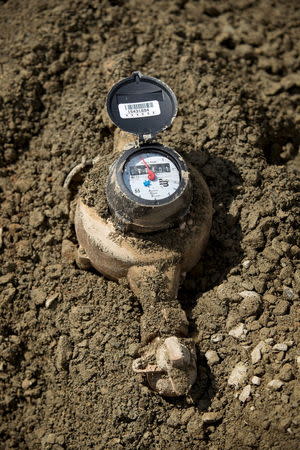 A freshly installed water meter is shown in Sacramento, April 8, 2015. REUTERS/James Glover III