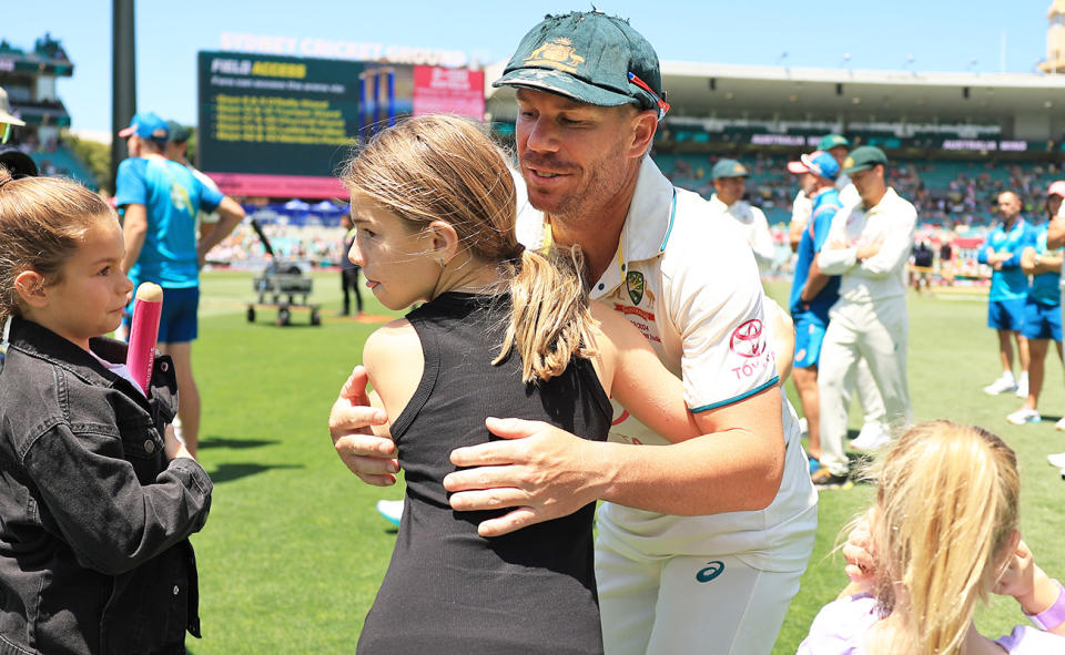 David Warner, pictured here with his daughters after his final Test match for Australia.