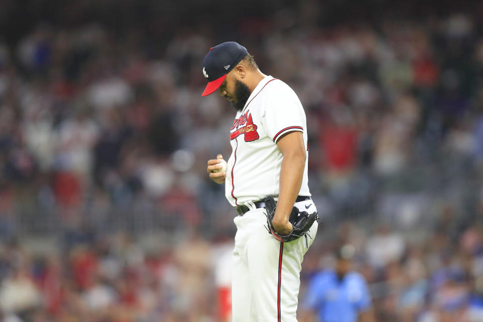 ATLANTA, GA - JUNE 25: Atlanta Braves relief pitcher and  former Dodger Kenley Jansen (74) takes a quiet moment before pitching the ninth inning during the Saturday evening MLB game between the Los Angeles Dodgers and the Atlanta Braves on June 25, 2022 at Truist Park in Atlanta, Georgia.  (Photo by David J. Griffin/Icon Sportswire via Getty Images)