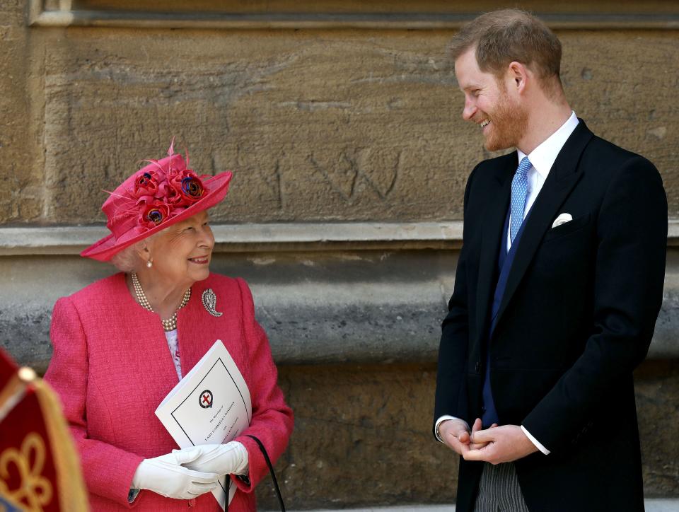 The Queen and Prince Harry share a joke at Lady Gabriella's wedding at her Windsor Castle wedding. 