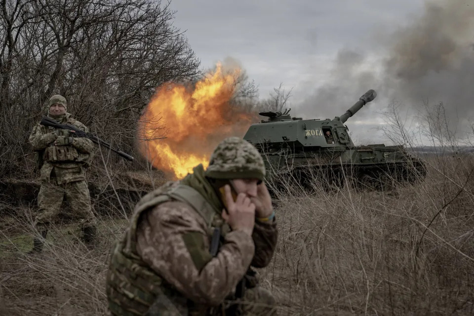 A Ukrainian soldier fires towards the Russian position as the Ukrainian soldiers from the artillery unit wait for ammunition assistance at the frontline in the direction of Avdiivka as the Russia-Ukraine war continues in Donetsk.