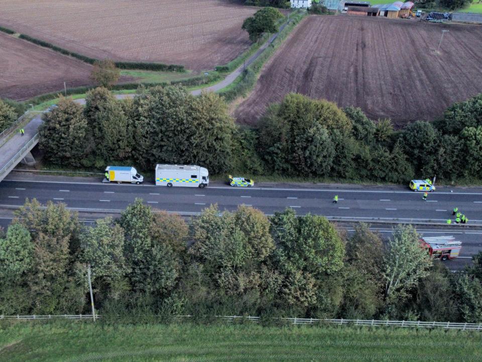 Emergency services at the scene of a coach crash on the M53 (Peter Byrne/PA Wire)