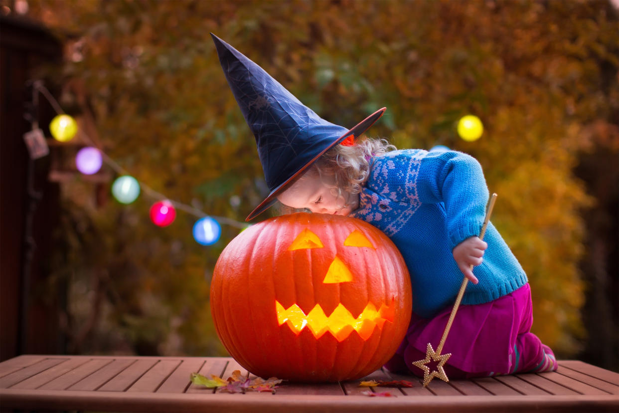 Talking to kids about what spooky sights they might expect to see during the Halloween season can help them feel more confident, say the moms behind Big Little Feelings. (Photo: Getty Creative)