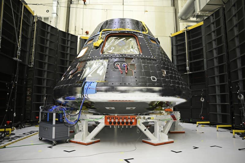 NASA's Artemis II Orion Spacecraft sits in the Operations and Checkout Building at the Kennedy Space Center in Florida in August. NASA announced Tuesday it will delay its Artemis launches to "work through challenges" and "ensure crew safety," as the space agency targets 2026 to return astronauts to the moon. File Photo by Joe Marino/UPI
