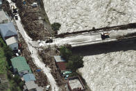 <p>Driftwood scatters near residential houses along a river in Iwaizumi town, Iwate prefecture, Japan, Aug. 31, 2016, after Typhoon Lionrock slammed into northern Japan on Tuesday evening. (Photo: Kyodo News/AP)</p>