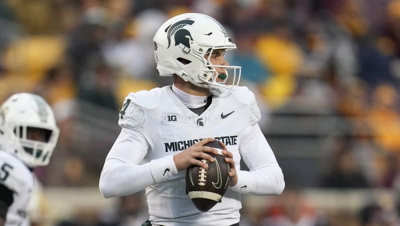 Michigan State quarterback Sam Leavitt looks to pass the ball during a college football game against Minnesota on Oct. 28, 2023, in Minneapolis.