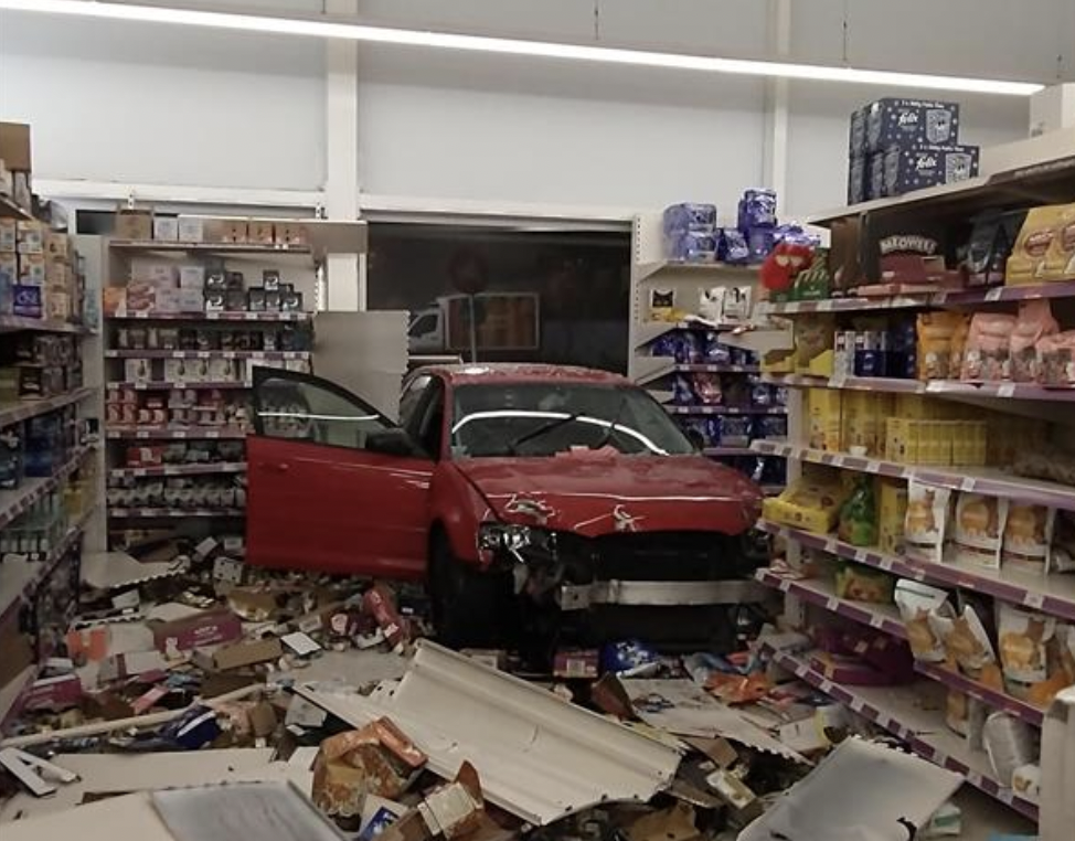 The car ploughed into the Sainsbury's store in Osmaston Park, Allenton, Derby. (Twitter/Derbyshire Roads Policing Unit)