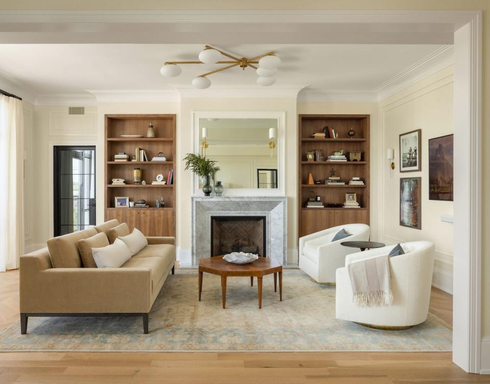 a living room with a fireplace