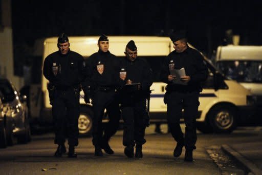 French riot police patrol the perimeter of a siege on an apartment block where Mohamed Merah, the man suspected of a series of deadly shootings, was holed up in Toulouse, southwestern France. French police stepped up pressure Thursday on the besieged Al-Qaeda militant who boasted of having "brought France to its knees" with a wave of brutal attacks that left seven dead