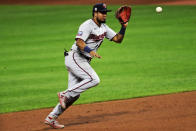 Minnesota Twins' Luis Arraez fields a ball hit by Cleveland Indians' Tyler Naquin in the eighth inning in a baseball game, Tuesday, Aug. 25, 2020, in Cleveland. Naquin was out on the play. (AP Photo/Tony Dejak)