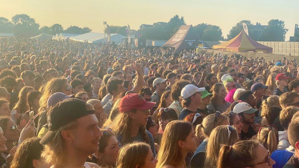 Festivalgoers watching a set at FORWARDS in Bristol on a summer evening