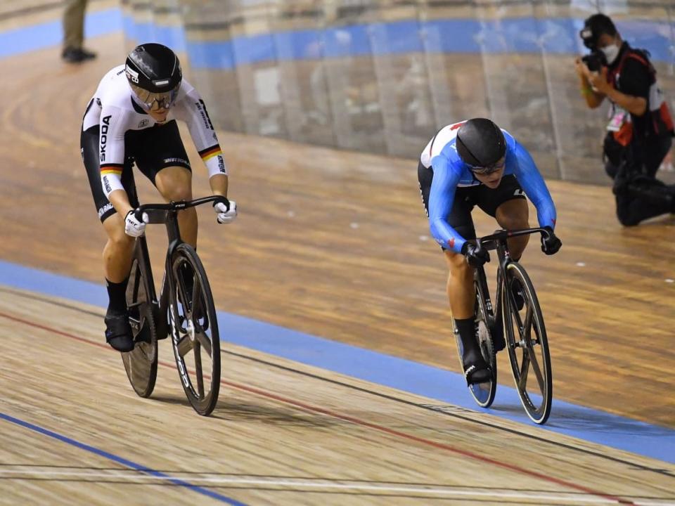 Canada's Lauriane Genest, right, shown in a file photo at the 2021 UCI Track Cycling World Championships, won a silver medal in the women's sprint event at the UCI Track Champions League competition in Panevėžys, Lithuania on Saturday. (Denis Charlet/AFP via Getty Images - image credit)