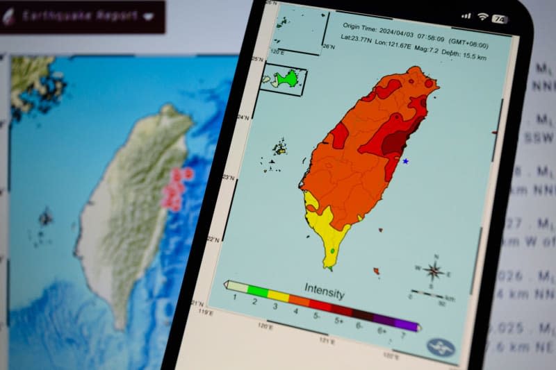 The intensity map of the Central Weather Administration (CWA) of Taiwan is displayed on a smartphone, after a 7.2-magnitude earthquake shook Taiwan on Wednesday. Andre M. Chang/ZUMA Press Wire/dpa