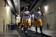 Dec 21, 2014; Tampa, FL, USA; Green Bay Packers quarterback Aaron Rodgers (12) walks to the field before the Green Bay Packers beat the Tampa Bay Buccaneers 20-3 at Raymond James Stadium. Mandatory Credit: David Manning-USA TODAY Sports