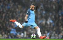 <p>Nicolas Otamendi moves to clear the ball </p>