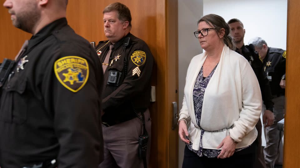 Jennifer Crumbley walks into an Oakland County courtroom Tuesday before being found guilty on four counts of involuntary manslaughter in Pontiac, Michigan. - Mandi Wright/AP