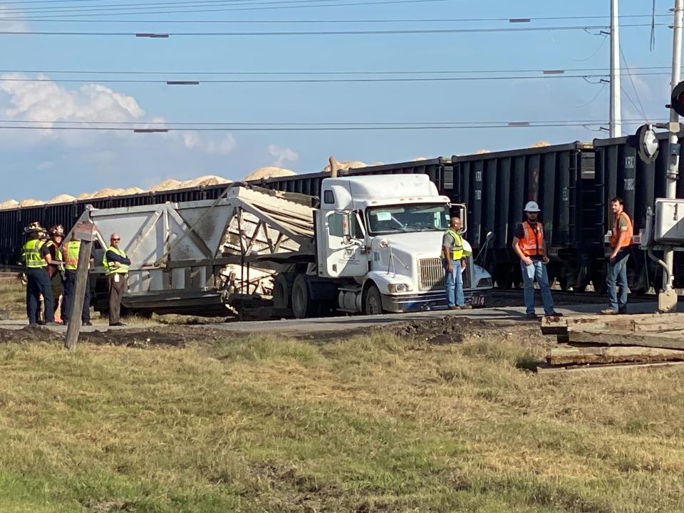 Crews responded to a crash involved a semi tractor-trailer and a train in Hutto on Monday | Jordan Belt/KXAN News