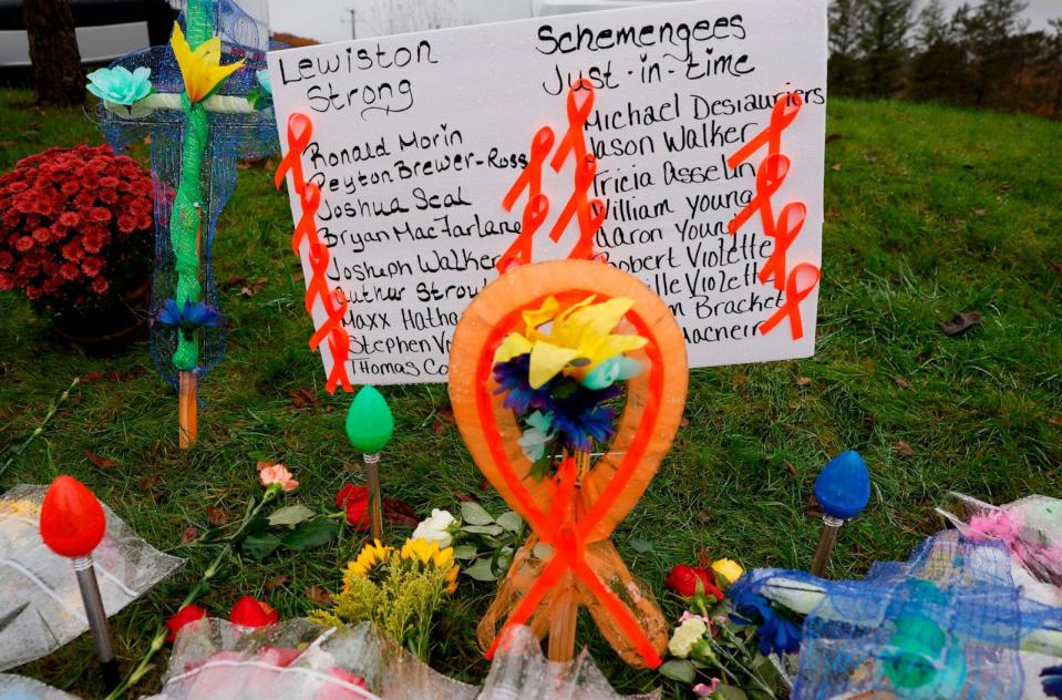 PHOTO: A makeshift memorial grows outside of Schemengees Bar & Grille on Lewiston, Maine on Oct. 30, 2023. (Jessica Rinaldi/The Boston Globe via Getty Images, FILE)