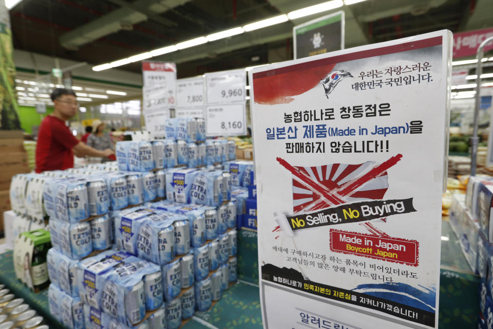 In this July 12, 2019, photo, a notice campaigning for a boycott of Japanese-made products is displayed in Seoul, South Korea. The sign reads: "We don't sell Japanese products." A widespread anti-Japanese boycott has gained ground in South Korea since Tokyo tightened its exports of materials used to manufacture semiconductors and display screens, key export items for South Korea.(AP Photo/Ahn Young-joon)